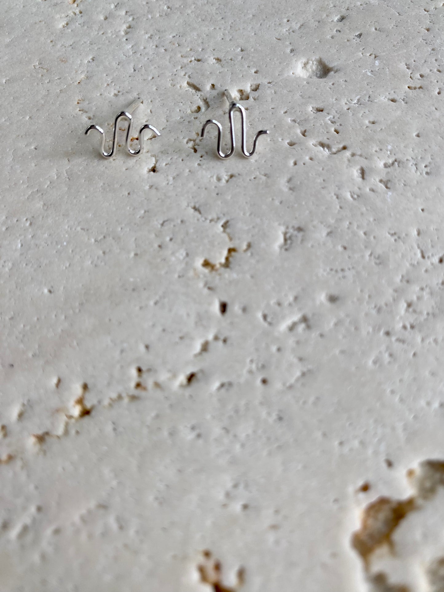 Squiggle studs